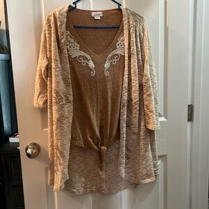 2 pieces. Both Ariat brand. L cover up, M shirt. Excellent condition.
